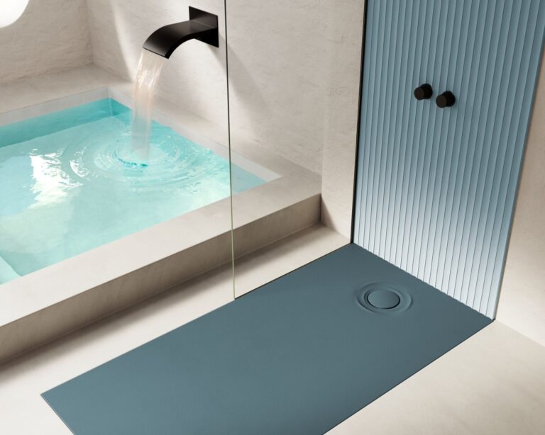 Acqua Zero: design born from a drop Acqua Zero represents the most poetic and minimalist expression of shower design. Its concept originates from a simple yet evocative image: the precise moment when a drop falls onto water and creates ripples that expand naturally. This fleeting, silent moment is transformed here into a permanent design feature. The tray surface, finished in Zero microtexture, conveys a clean, elegant and almost ethereal aesthetic. Around the circular grille, seamlessly integrated into the Akron material, soft concentric ripples appear, adding movement and visual depth while maintaining a sense of restraint. Additionally, Acqua Zero has been recognised in the Product category at the iF Design Awards, one of the most prestigious international design competitions